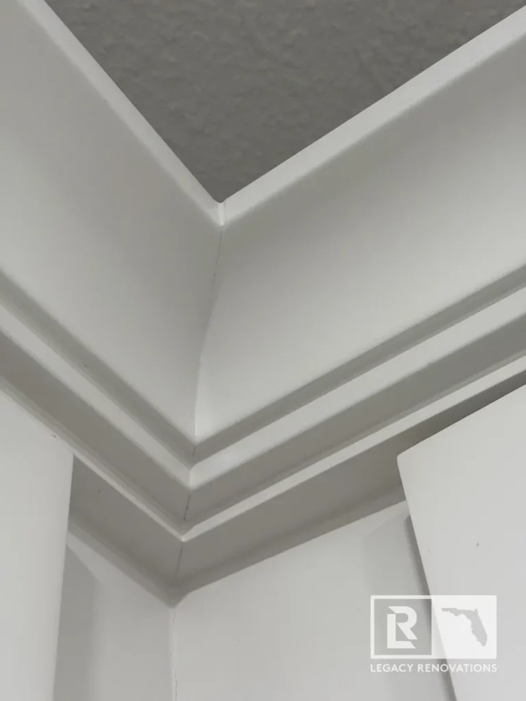 White crown molding at a kitchen ceiling corner in St. John, Jacksonville, FL