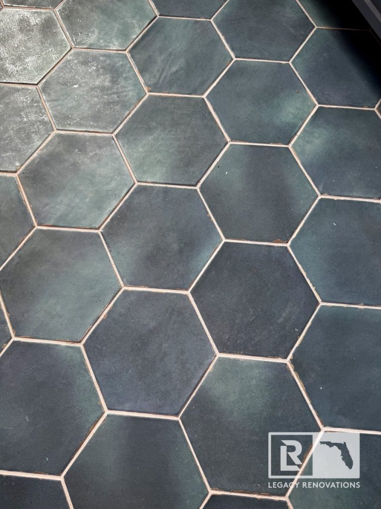 four inch blue hexagon glass tile on new bathroom floor in jacksonville fl